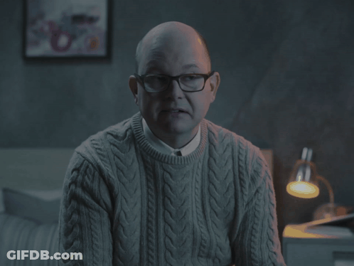 Man In Grey Sweater And Glasses Says It's Good To Be The King GIF