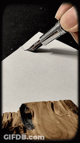 Man In Grey Sweater And Red Watch In Hallway GIF