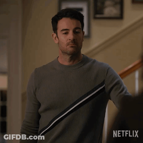Man In Grey Sweater Asking What Are You Doing Here GIF