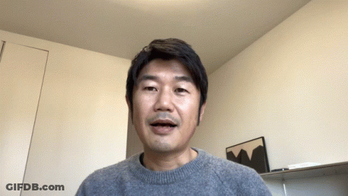 Man In Grey Sweater GIF