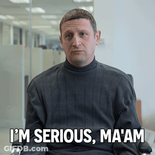 Man In Grey Sweater Saying Im Serious Ma'am GIF