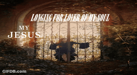 Man In Grey Sweater Sitting Next To Woman In Hallmark Spring Of Love Ad GIF