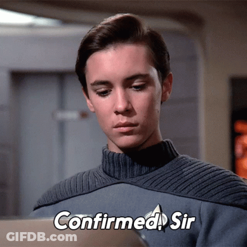 Man In Grey Sweater With Confirmed Sir GIF