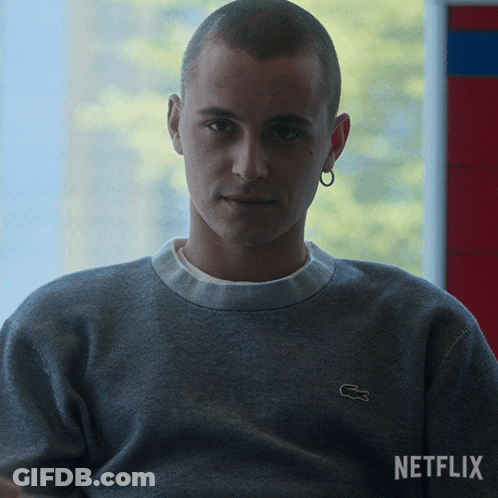 Man In Grey Sweater With Lacoste Logo GIF