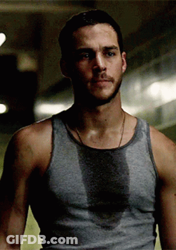 Man In Grey Tank Top Sweating GIF