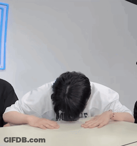 Man In GS Sweatshirt Covering Face GIF
