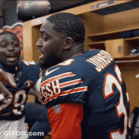 Man In GSH Jersey Talking To Another Man GIF