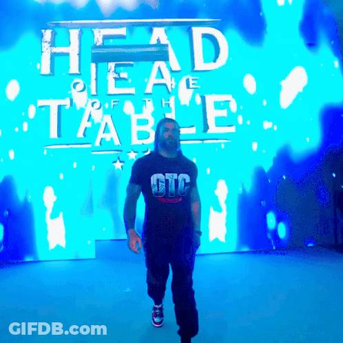 Man In GTC Shirt Walking Past Blue Screen GIF