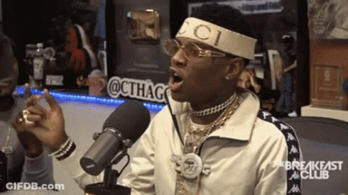 Man In Gucci Headband Singing Into Microphone GIF