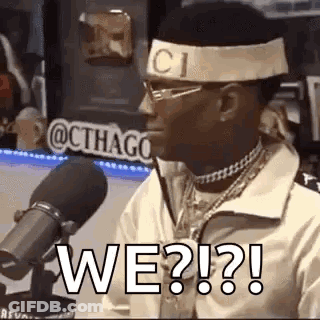 Man In Gucci Headband Talking Into Microphone GIF