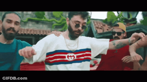 Man In Gucci Shirt Dancing With Group GIF