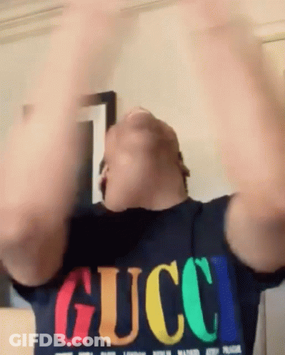 Man In Gucci T-Shirt Arms In Air GIF