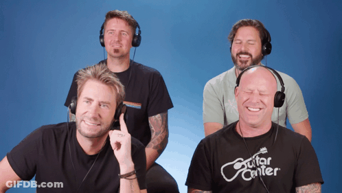 Man In Guitar Center T-Shirt Smiling GIF