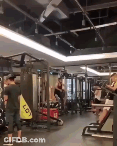 Man In Gym With Bag Saying Lot GIF