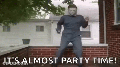 Man In Halloween Costume Dancing In Front Of Brick Wall GIF