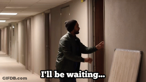 Man In Hallway I'll Be Waiting GIF