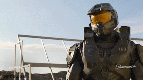 Man In Halo Costume In Front Of Paramount Sign GIF