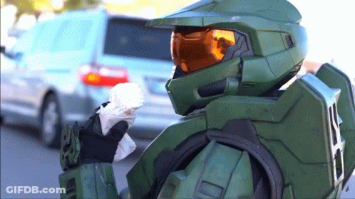Man In Halo Helmet Holding Paper GIF