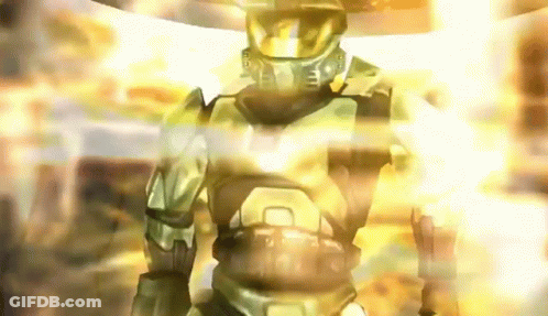 Man In Halo Helmet Standing In Front Of Yellow Light GIF