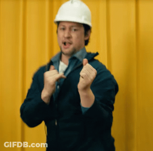 Man In Hard Hat And Blue Jacket Making Funny Face GIF