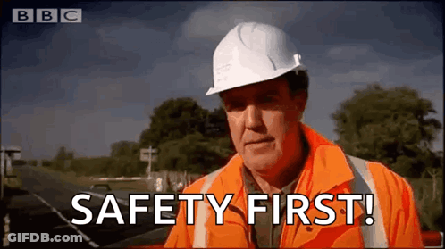 Man In Hard Hat And Orange Jacket On BBC Channel GIF