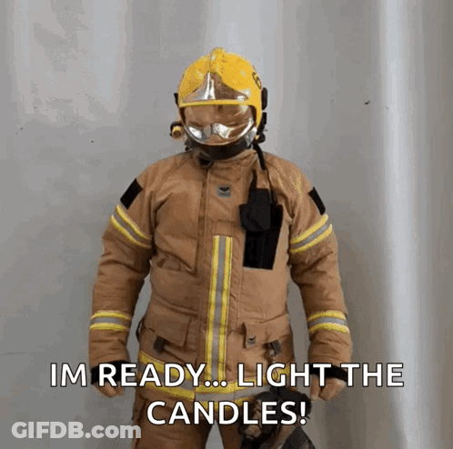 Man In Hard Hat And Suspenders Holding Stick In Front Of Yellow Blippi Building GIF