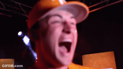 Man In Hard Hat Laughing With Mouth Open GIF