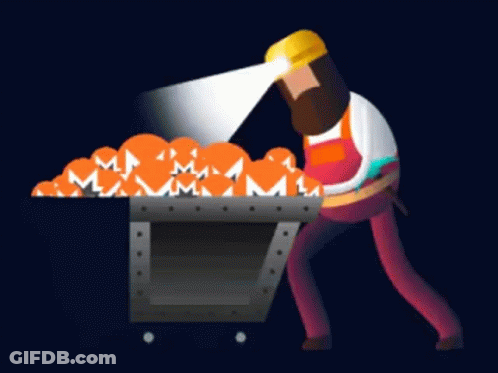 Man In Hard Hat Pushing Wheelbarrow Of Pumpkins GIF