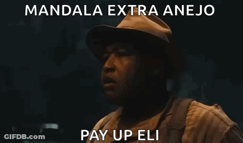 Man In Hat And Backpack Standing In Dark Room GIF