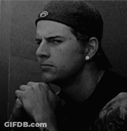 Man In Hat And Black Shirt Giving Middle Finger GIF