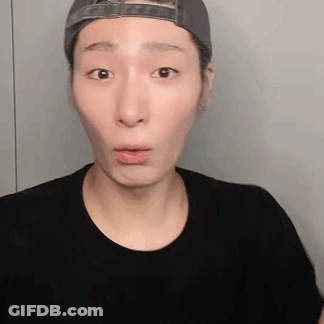 Man In Hat And Black Shirt Making Funny Face GIF