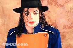 Man In Hat And Blue Jacket Holding Orange Paper GIF