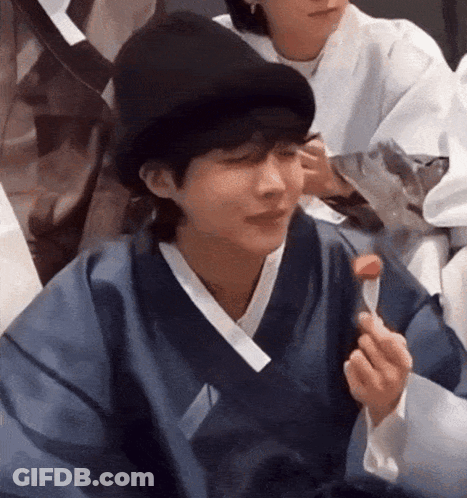 Man In Hat And Blue Kimono Eating With Spoon GIF