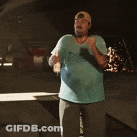 Man In Hat And Blue Shirt Holding Beer GIF