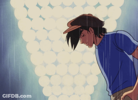 Man In Hat And Blue Shirt In Rain GIF