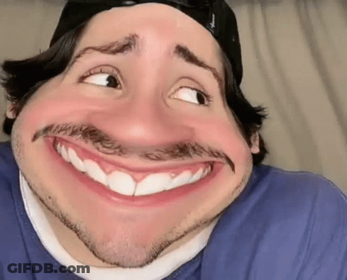 Man In Hat And Blue Shirt Making Funny Face GIF