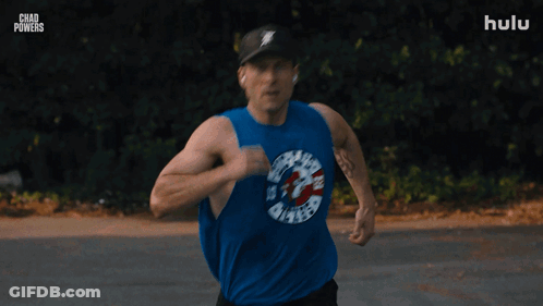 Man In Hat And Blue Tank Top Running With Chad Powers GIF