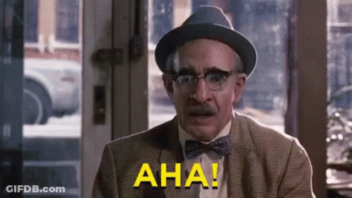 Man In Hat And Bow Tie Says Aha GIF