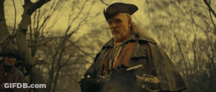 Man In Hat And Cape Holding Sword GIF