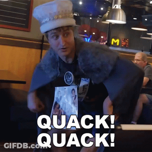 Man In Hat And Cape Saying Quack GIF