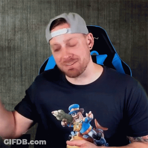 Man In Hat And Cartoon T-Shirt GIF