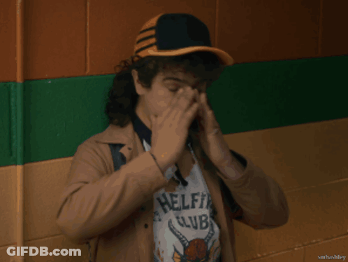 Man In Hat And Club Shirt Covering Face GIF