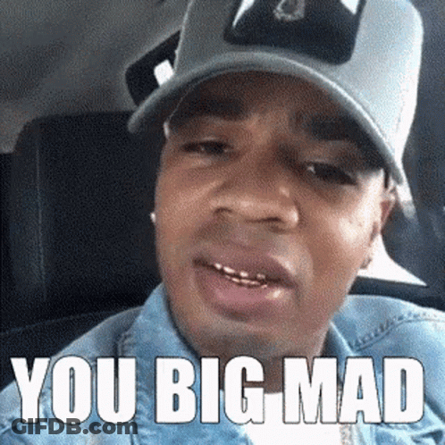 Man In Hat And Denim Jacket Making Funny Face GIF