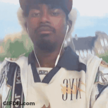 Man In Hat And Ear Buds With Zyi Shirt GIF