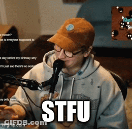 Man In Hat And Glasses At Microphone With STFU Text GIF