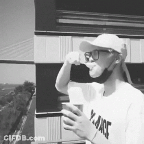 Man In Hat And Glasses Drinking From Y.M.Ace Cup GIF