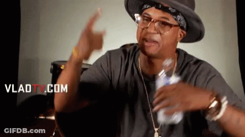 Man In Hat And Glasses Holding Water Bottle GIF