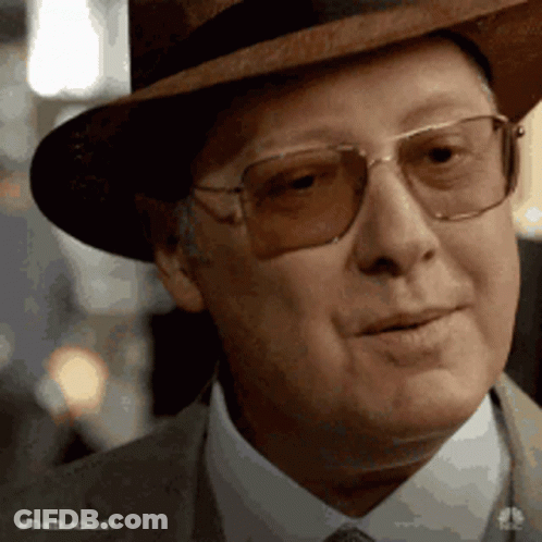 Man In Hat And Glasses Smiling At Camera GIF