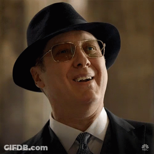 Man In Hat And Glasses Smiling #Theblacklist GIF