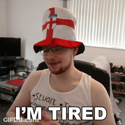 Man In Hat And Glasses With I'm Tired Shirt GIF